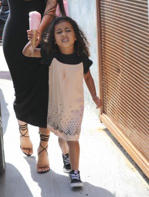 North West screaaams at Paparazzi